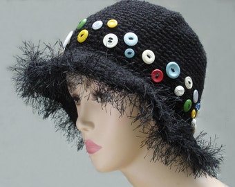 Black crocheted cloche hat with color buttons