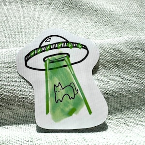 Alien Cat Sticker, UFO Cat Sticker, Vinyl Sticker, UV Resistant and Waterproof, Perfect For Laptops, Water Bottles, Notebooks, Planners
