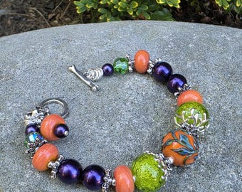 Bubble Bubble Toil and Trouble Halloween Lampwork Bead Bracelet, Autumn, Beaded, purple, orange, green, pumpkin, leaves and vines