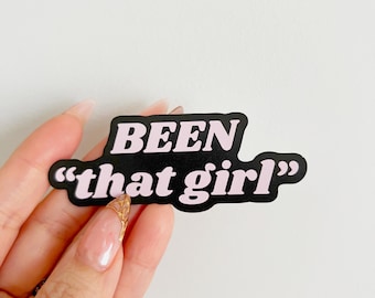 May include: Black and pink sticker with the text "BEEN "that girl""
