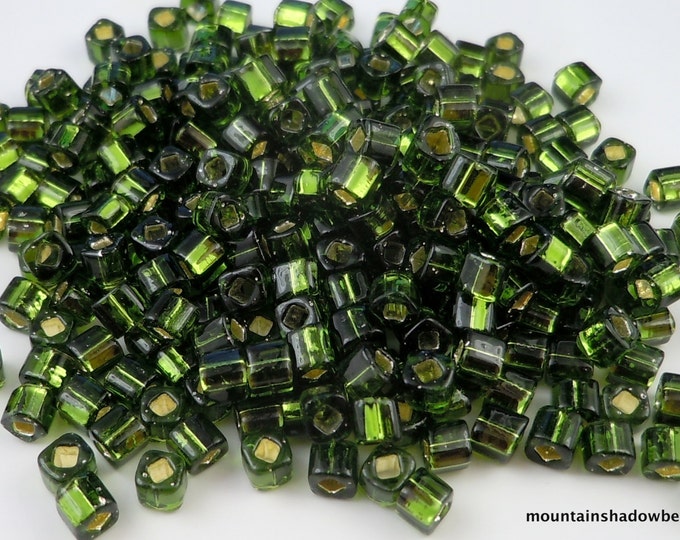 8 grams Toho Seed Beads 3mm Cube  Silver Lined Olivine 12 - 13