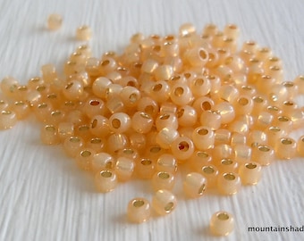 Silver Lined Milky Light Topaz - 11/0 Toho Seed Beads - 8 grams (BX 11 - 21)