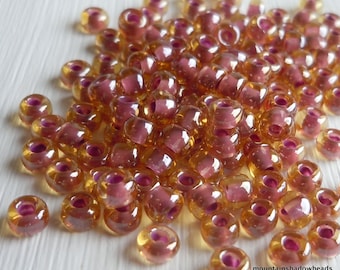 100 Toho Seed Beads 6/0  Inside Color Light Topaz Pink Lined 12 - 27