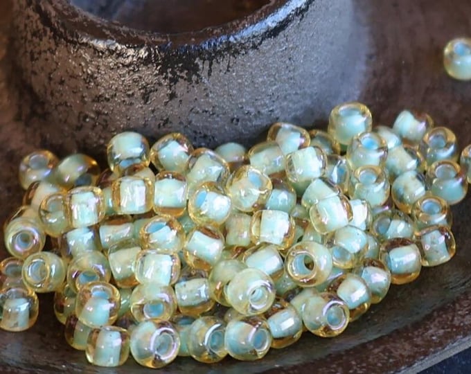 100 Toho Japanese Seed Beads Lt Topaz/Sea Foam Lined 6/0  (BX 10 - 22)