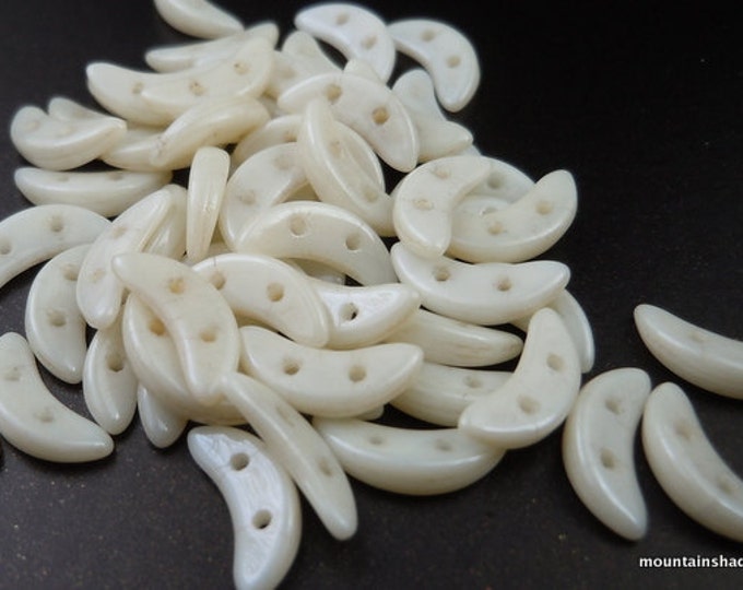 10 gram pack CzechMates 10mm Crescent Bead - 2 Hole Luster Opaque Champagne Luster (BX 1 - 15)