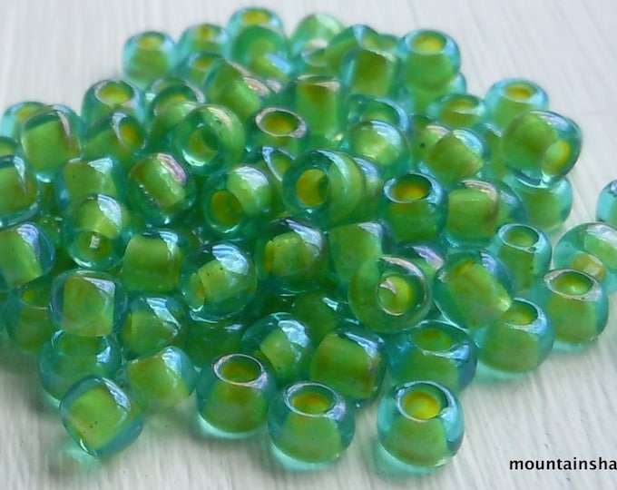 6/0 Toho Seed Beads -  Inside Color Aqua/Opaque Yellow Lined