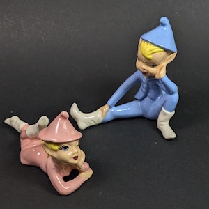 Vintage Ceramic Pixies Elves Pair Pink and Blue Sitting Laying Down MCM Figurines