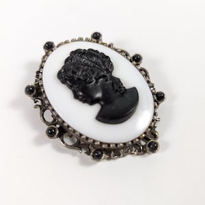 Black on White Oval Vintage Cameo Brooch Pin - Silver Tone Metal Scroll