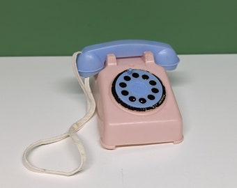 vintage small pink n blue play phone