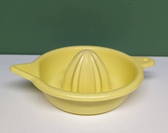 vintage yellow Lustroware juicer