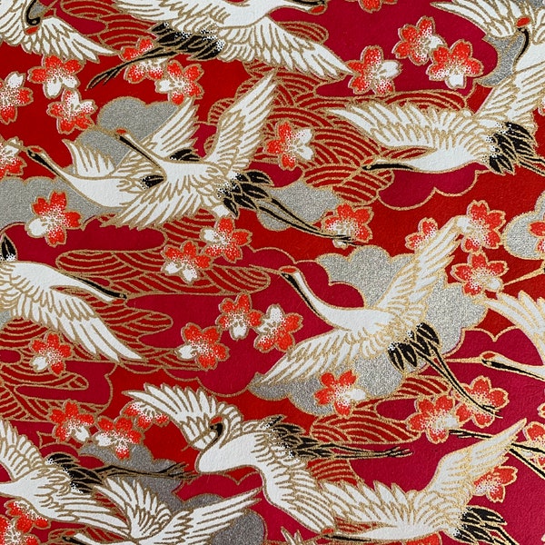 Chiyogami or yuzen paper - long life, white cranes with red cherry blossoms on waves of silver clouds with gold accents, 9x12 inches