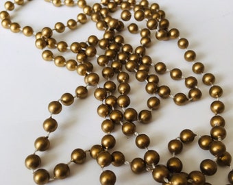 Vintage necklace - matt yellow gold self strung plastic beads - Costume Jewelry