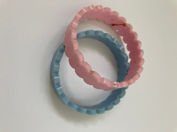 Pair of hard plastic bangles in pale blue and bab… - image 2