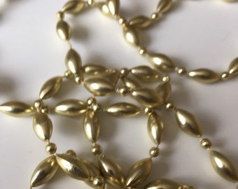 Vintage necklace - pale yellow gold self strung plastic beads - Costume Jewelry