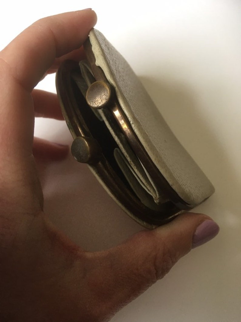 Small cream leather vintage purse.