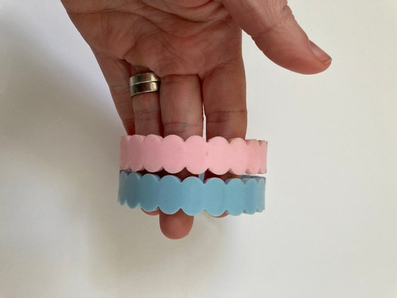 Pair of hard plastic bangles in pale blue and bab… - image 3