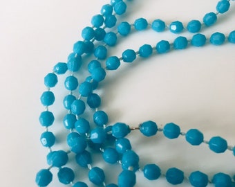 Vintage necklace - bright turquoise blue self strung plastic beads - Costume Jewelry