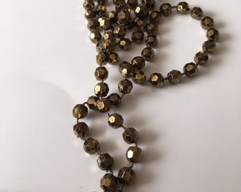 Vintage necklace - old gold self strung plastic beads - Costume Jewelry