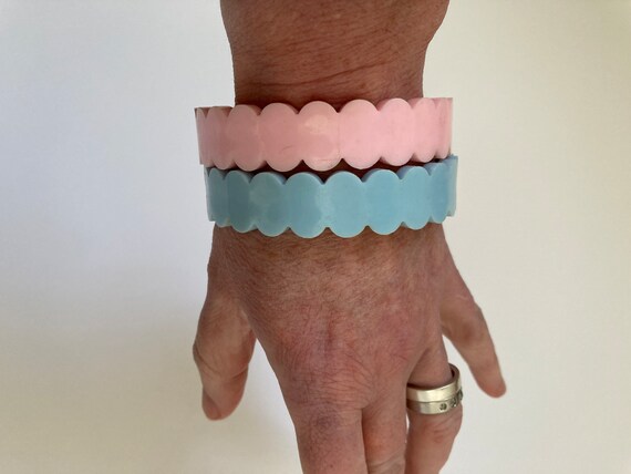 Pair of hard plastic bangles in pale blue and bab… - image 4