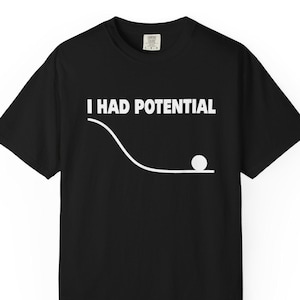 May include: A set of three ceramic mugs with a speckled, matte finish. The mugs are in shades of cream, light gray, and dark gray. Each mug has a simple, minimalist design, perfect for coffee or tea.