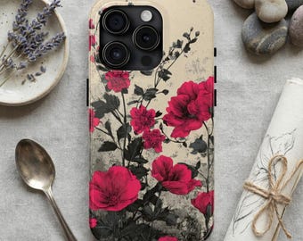 May include: A phone case with a floral design featuring vibrant red flowers and dark green leaves against a beige background. The case has a matte finish and a protective design. The case is a stylish accessory for a smartphone.