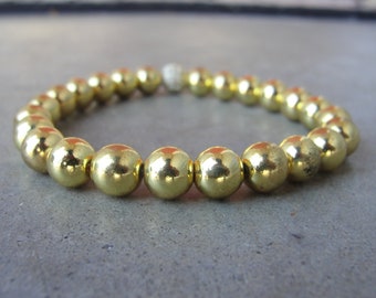 Brass Gold Hematite Bracelet. Rhinestone Focal Bead. Gemstone Beaded Stretch Bracelet. Gold Round Beads. Handmade Jewelry.