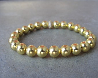 Brass Gold Hematite Bracelet. Rhinestone Focal Bead. Gemstone Beaded Stretch Bracelet. Gold Round Beads. Handmade Jewelry.