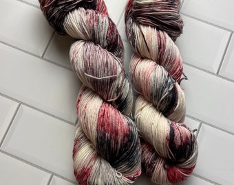 Captain Picard Hand Dyed Yarn: Red Black Speckled Superwash Merino Yarn