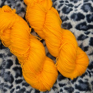 Hand Dyed Yarn.  Sock Yarn. Orange Push Pop. Superwash Yarn. Semisolid Yarn.