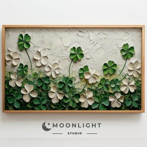 May include: A framed painting depicting a field of green four-leaf clovers with white flowers. The painting is created in a textured style, giving the impression of raised paint.