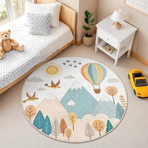 Soft blue and green mountain landscape with snow-capped peaks and playful birds designed for children's activity spaces
