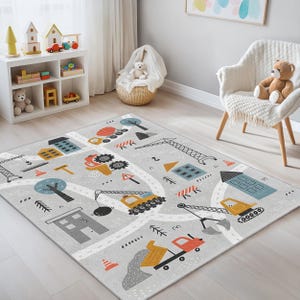 Non-slip kids rug with a detailed road layout and construction site graphics, ideal for safe and interactive play in nursery and toddler spaces