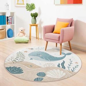 Playroom rug with calming underwater scene, including whimsical whale, starfish, and aquatic plants, suitable for baby or toddler rooms.