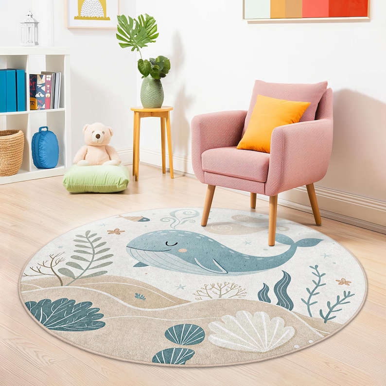 Playroom rug with calming underwater scene, including whimsical whale, starfish, and aquatic plants, suitable for baby or toddler rooms.