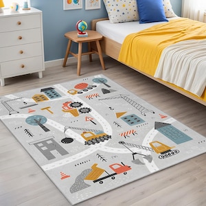 Washable cotton and polyester children's rug with vibrant digital prints of cranes, concrete mixers, and playful trees, easy to care for and maintain
