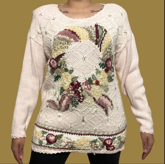 Heirloom Collectibles pink sweater