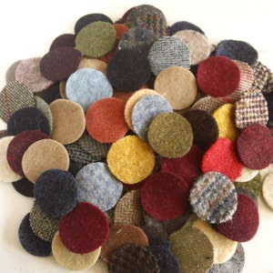 May include: A collection of colourful felt circles in various patterns and textures. The circles are approximately 1 inch in diameter and are perfect for crafting projects.