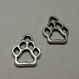 Paw Print Charms 50 pcs. Silver Paw Prints Silver Dog Charms Cat Charms Animal Charms Dog Paw Charm Paw Charm Cat Paw Charm image 1