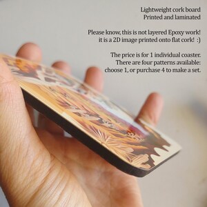 May include: A close-up of a cork coaster with a desert landscape design. The coaster is printed on a lightweight cork board and laminated. The text "Lightweight cork board Printed and laminated" is at the top of the image. The text "Please know, this is not layered Epoxy work! It is a 2D image printed onto flat cork! :)" is in the middle of the image. The text "The price is for 1 individual coaster. There are four patterns available: choose 1, or purchase 4 to make a set." is at the bottom of the image.