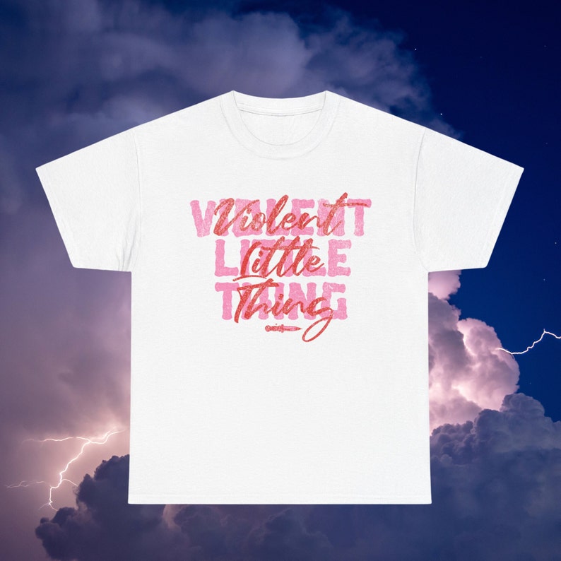 May include: White t-shirt with the text "Violent Little Thing" in pink lettering.