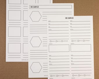 May include: Three white ink sample sheets with black text. The sheets have sections for pen, ink, and notes, with the text "INK SAMPLES" at the top. The bottom sheet has the website address www.wellappointeddesk.com.