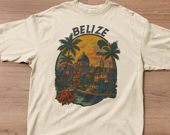 Könnte beinhalten: Cremefarbenes T-Shirt mit einer farbenfrohen Grafik von Belize mit Palmen, Gebäuden und dem Wort "BELIZE". Das Shirt wird mit hellblauen Jeans und rot-weißen Turnschuhen kombiniert.
