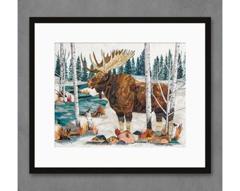 May include: A framed collage art print featuring a brown moose standing in a snowy forest with birch trees. The moose has large antlers and is looking to the left. The background is a mix of white snow, brown trees, and blue sky.