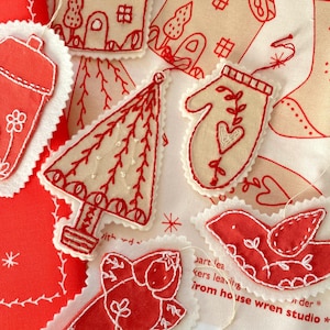 ornaments panel to stitch tan sampler, tree, mitten, stocking, cottage, star