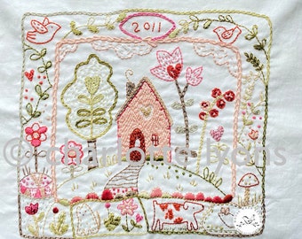 love-ly  stitchable embroidery sampler design printed on cotton