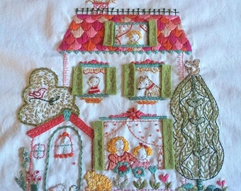 West End embroidery sampler - stitch your own colorful cottage with children, pets and a garden