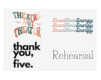 May include: A set of five stickers with colorful text. The stickers say "Theatre not Theater", "Lead Role Energy" repeated three times, "thank you, five", and "Rehearsal I can't, I have".