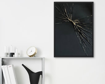 May include: Black and gold abstract art print in a black frame. The print features a gold design that resembles a crack or fracture in the black background.