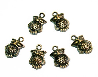 The Bronze Owl- designer charms- designer pendants- bird charms- bird pendants- jewelry supplies- beading supplies- lead free pendants