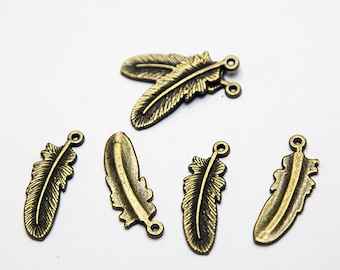 Antiqued Brass Feathers- jewelry supplies- beading supplies- jewelry findings- feather charms- feather pendants- lead free charms- bronze